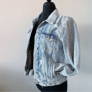 Distressed denim jacket